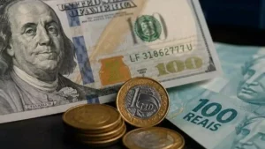 Dólar cai a R$ 5,10 com Selic a 14%; Ibovespa recua