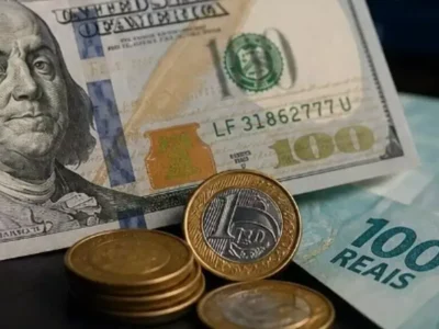 Dólar cai a R$ 5,10 com Selic a 14%; Ibovespa recua